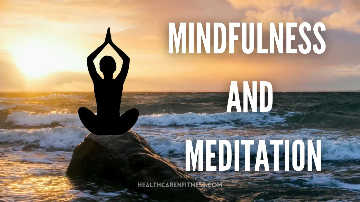 Lady practicing mindfulness and meditation during a sunset on a beach.